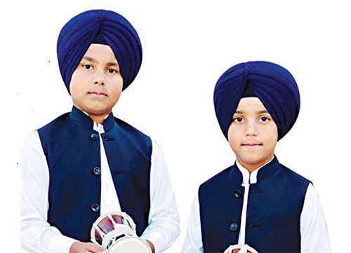  ਅਮਰੀਕਾ 'ਚ ਛੋਟੀ ਉਮਰੇ ਵੱਡੀਆਂ ਪੁਲਾਂਘਾਂ ਪੁੱਟਣ ਵਾਲੇ ਬਾਲ ਢਾਡੀ ਅੰਗਦ ਸਿੰਘ ਲੁਹਾਰਾ-ਕਰਮਨ ਸਿੰਘ ਲੁਹਾਰਾ